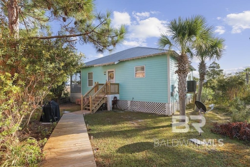 Check out this charming 3-bedroom, 2-bathroom cottage in Rookery - Beach Home for sale in Gulf Shores, Alabama on Beachhouse.com