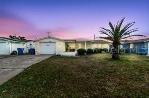 Move-in ready and beautifully maintained, this spacious home - Beach Home for sale in Holiday, Florida on Beachhouse.com