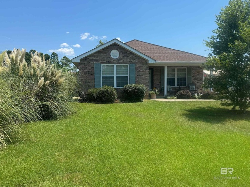 Welcome to this coastal brick cottage offering comfortable and - Beach Home for sale in Lillian, Alabama on Beachhouse.com