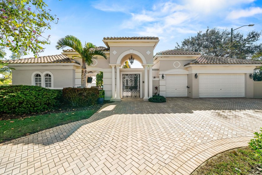 Tucked away on a quiet cul-de-sac, this exceptional custom - Beach Home for sale in Boynton Beach, Florida on Beachhouse.com