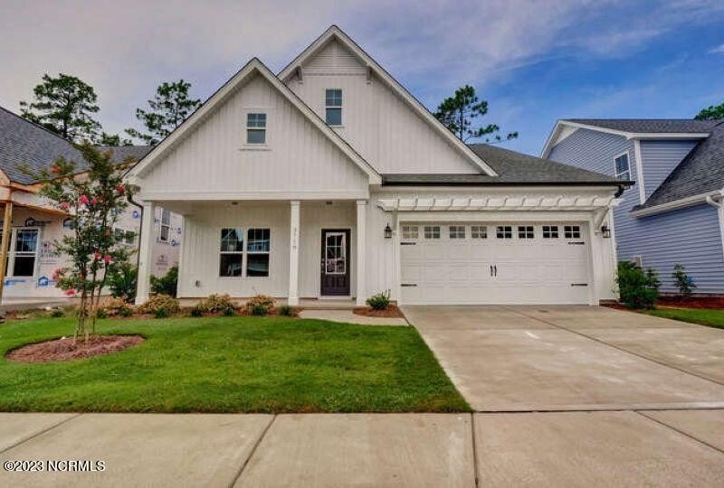 Under construction is The Madison from American Homesmith, a - Beach Home for sale in Leland, North Carolina on Beachhouse.com