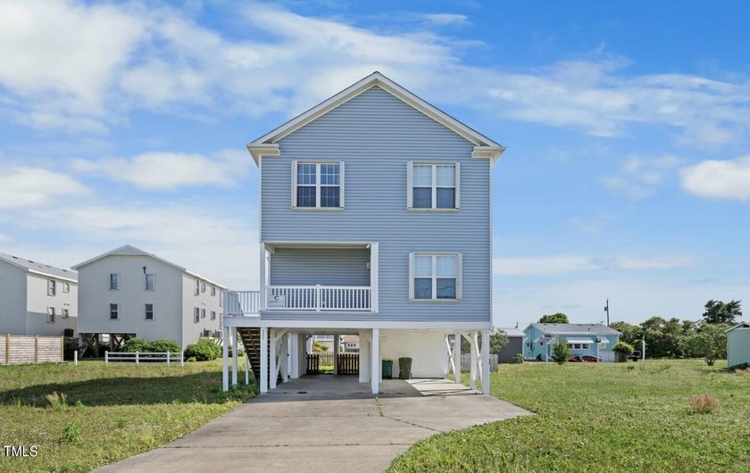 Welcome to your new beachside retreat--an inviting 4-bedroom, 4 - Beach Home for sale in Carolina Beach, North Carolina on Beachhouse.com