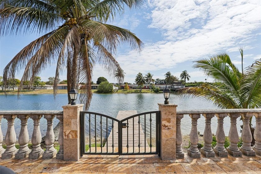Lakefront paradise with stunning water views, private pool & - Beach Home for sale in Miami, Florida on Beachhouse.com