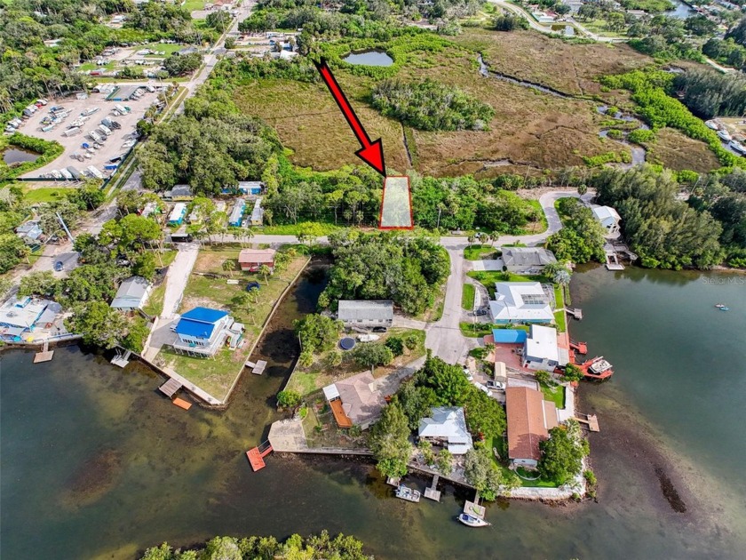 This undeveloped lot is located in the WATERFRONT COMMUNITY of - Beach Lot for sale in Hudson, Florida on Beachhouse.com