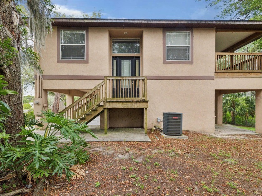 This charming stilt home features a BRAND NEW ROOF and has 3 - Beach Home for sale in Hudson, Florida on Beachhouse.com