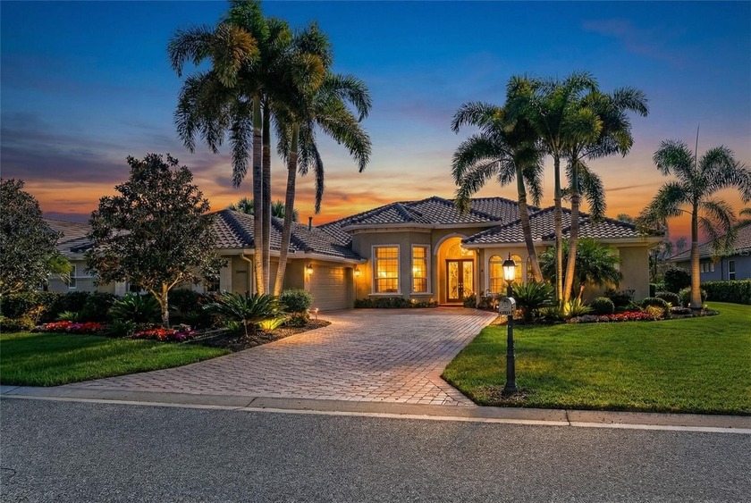 Set on a private lake with preserve and golf course views, this - Beach Home for sale in Bradenton, Florida on Beachhouse.com