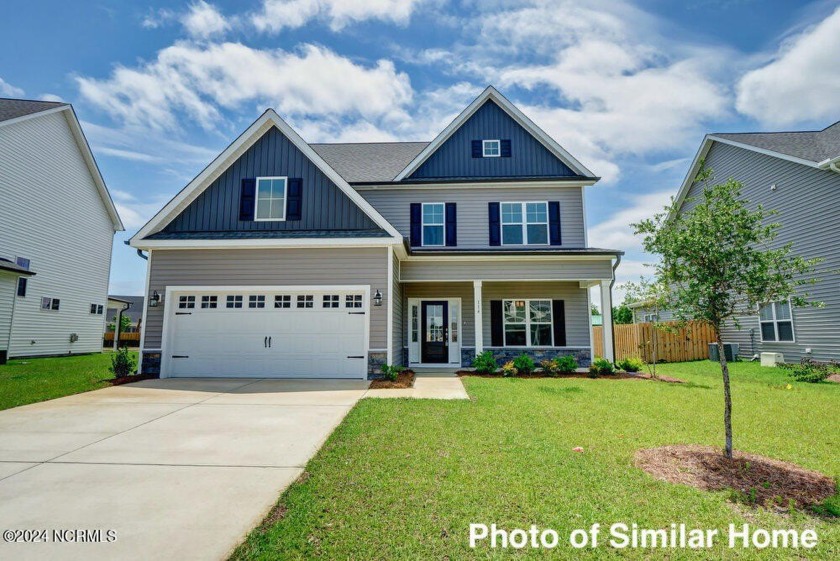 Discover the spacious elegance of The Cedar by American - Beach Home for sale in Leland, North Carolina on Beachhouse.com