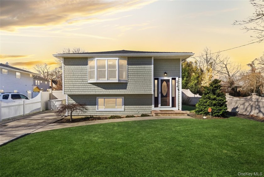 Enjoy the Babylon Village lifestyle in this sun-filled Hi-Ranch - Beach Home for sale in Babylon, New York on Beachhouse.com
