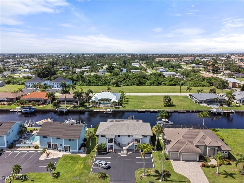 This beautiful 2-bedroom, 2-bath condo is perfectly situated on - Beach Townhome/Townhouse for sale in Punta Gorda, Florida on Beachhouse.com