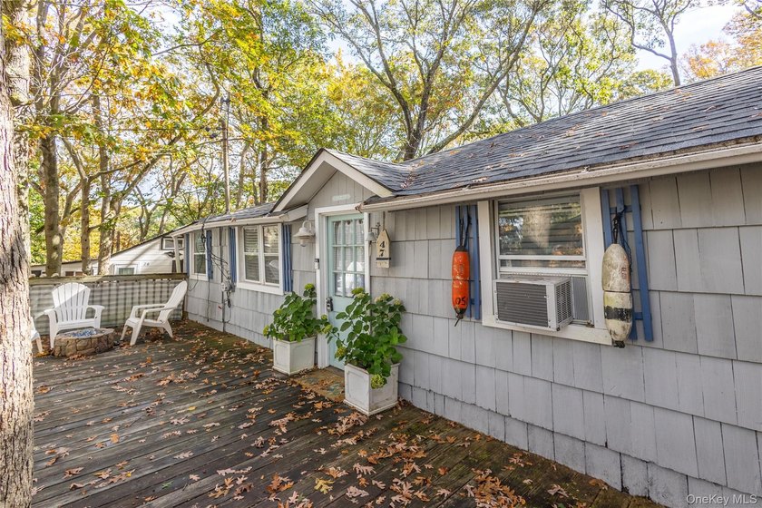 As far as Beach Cottages go this one SCREAMS beach vibes from - Beach Home for sale in Baiting Hollow, New York on Beachhouse.com