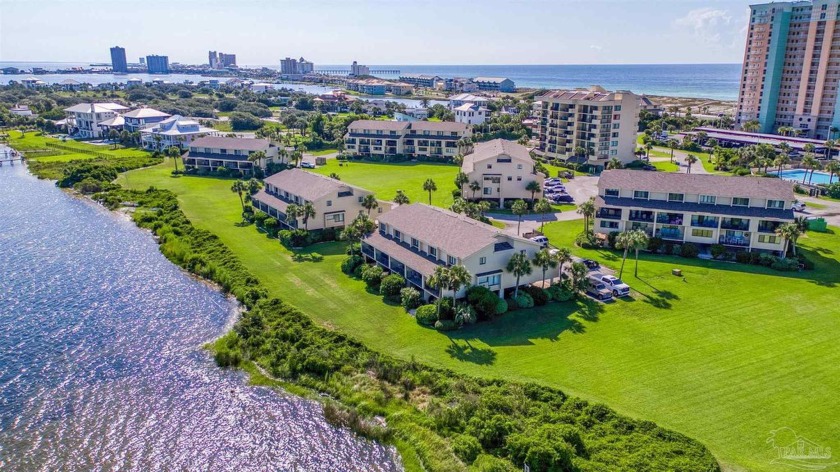 This beautifully updated 2-bedroom, 2.5-bath condo sits directly - Beach Condo for sale in Pensacola Beach, Florida on Beachhouse.com