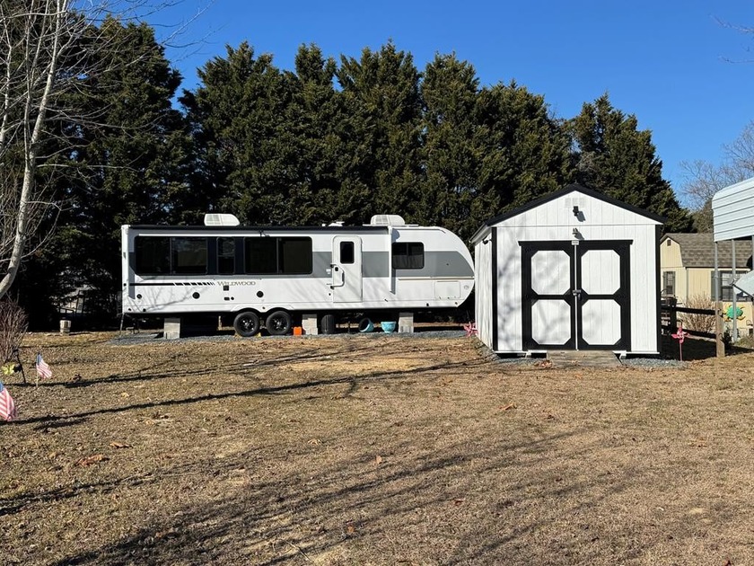 This is a rare treat.  Brand New 2025 Wildwood camper.  Just - Beach Lot for sale in Horntown, Virginia on Beachhouse.com