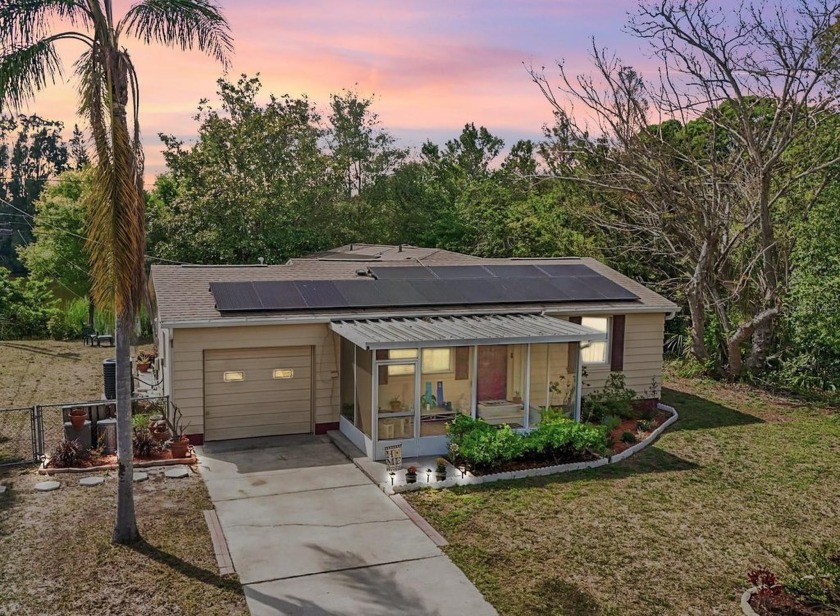 Lakefront St. Pete SOLAR Home with EXTREMELY LOW ELECTRIC - Beach Home for sale in St. Petersburg, Florida on Beachhouse.com