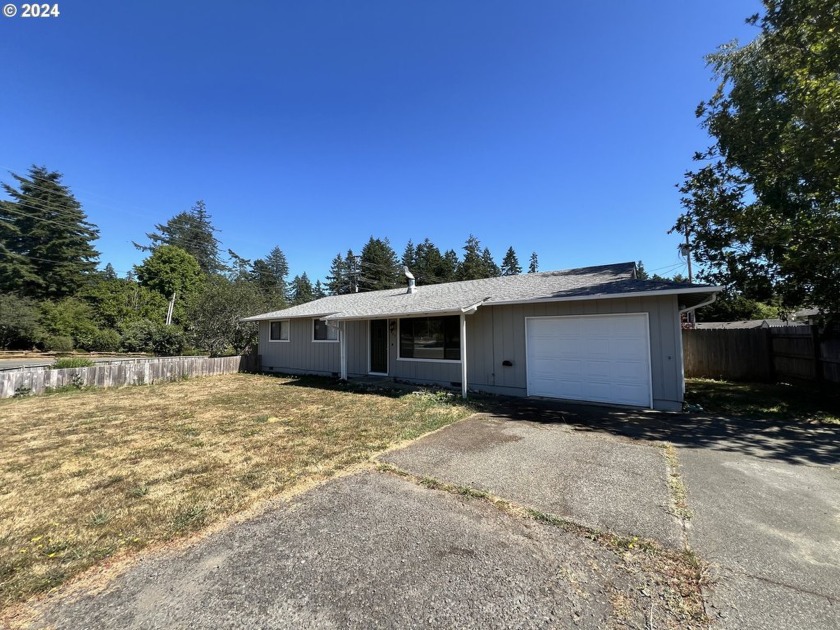 Welcome to your charming 3-bedroom, 1-bath home situated on a - Beach Home for sale in Brookings, Oregon on Beachhouse.com