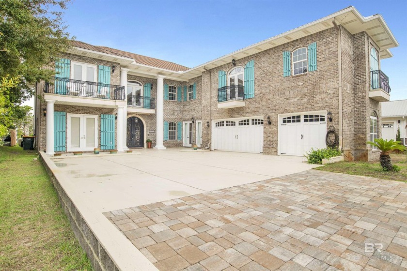 This luxurious 6 bed/5 bath canal-front home is a dream come - Beach Home for sale in Orange Beach, Alabama on Beachhouse.com