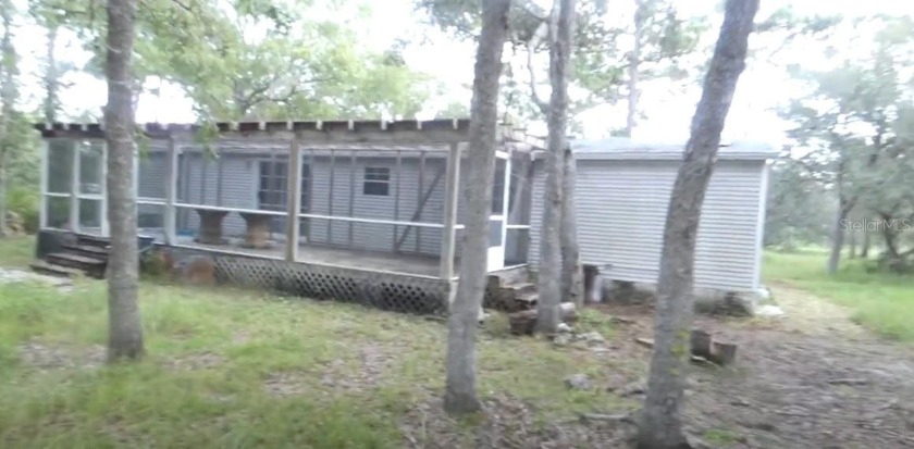 4.91 Acres, 1993 Double Wide, Vaulted Ceilings, 2023 Roof, 2023 - Beach Home for sale in Homosassa, Florida on Beachhouse.com