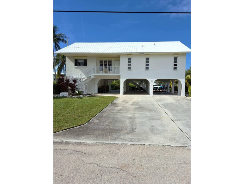 1 Ave F, Marathon, FL 33050.  Beautiful canal front home for - Beach Home for sale in Marathon, Florida on Beachhouse.com