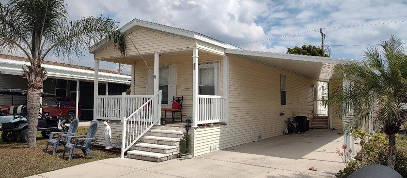 NICE 2013 HOME WITH A LARGE FRONT PORCH IS WAITING FOR A NEW - Beach Home for sale in North Fort Myers, Florida on Beachhouse.com
