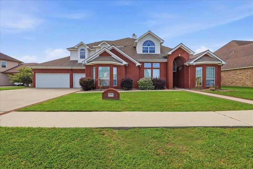 Stunning one-owner custom home located in the highly-sought PNG - Beach Home for sale in Port Arthur, Texas on Beachhouse.com