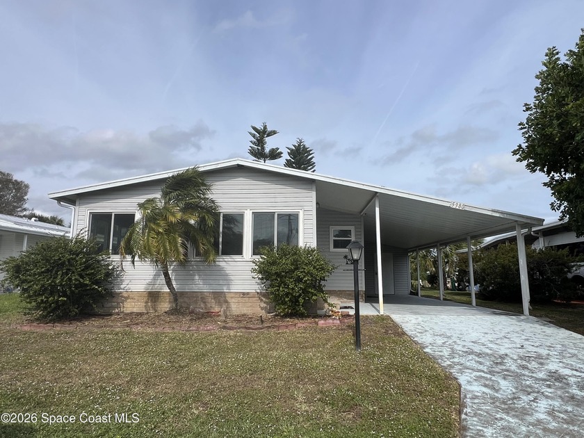 Head south for the winter in this TURN KEY home in Florida. This - Beach Home for sale in Micco, Florida on Beachhouse.com