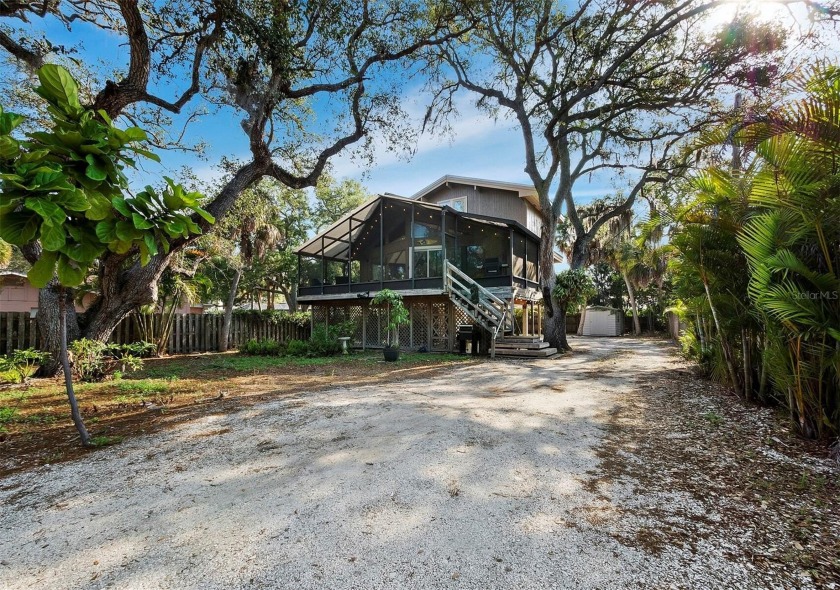 Now offered with a significant price reduction! Tucked away on a - Beach Home for sale in Sarasota, Florida on Beachhouse.com