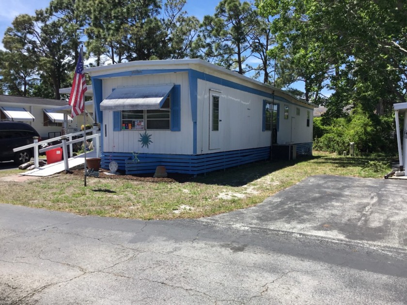 This quaint two bedroom, one 1/2 bath home sits in the back of a - Beach Home for sale in Titusville, Florida on Beachhouse.com