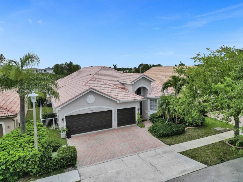 Indulge in your private oasis with a sparkling pool and charming - Beach Home for sale in Miramar, Florida on Beachhouse.com