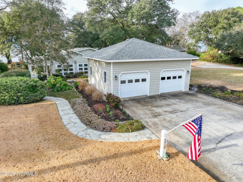 This meticulously maintained home is nestled on a quiet street - Beach Home for sale in Point Harbor, North Carolina on Beachhouse.com