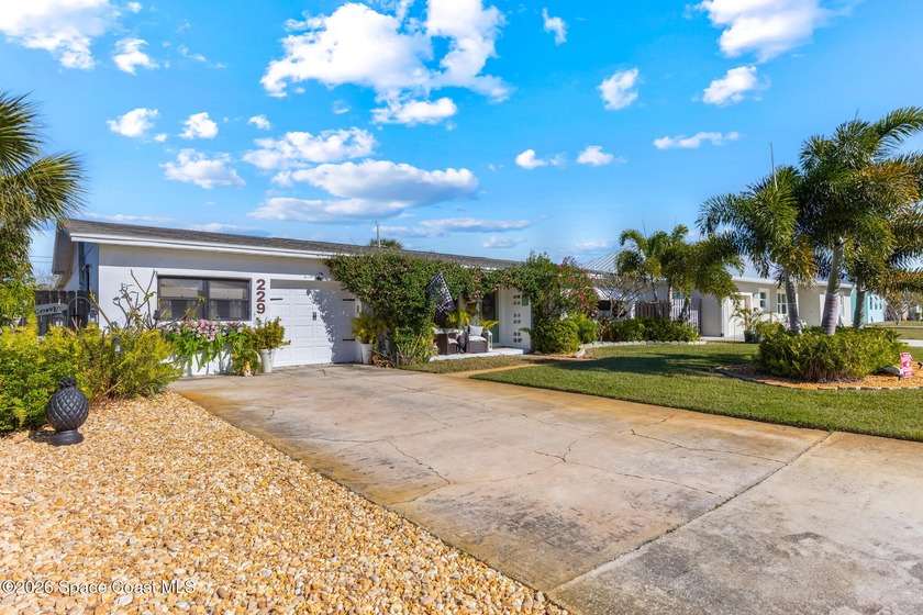 Escape to this inviting 3-bedroom, 2-bath beachside retreat - Beach Home for sale in Satellite Beach, Florida on Beachhouse.com