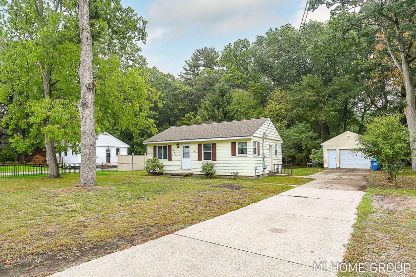 Welcome to this charming 2 bedroom, 1 bath home located in the - Beach Home for sale in Grand Haven, Michigan on Beachhouse.com