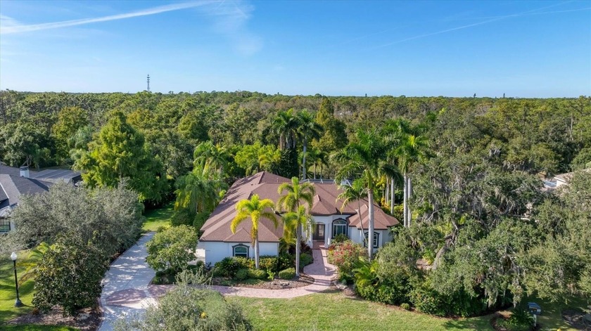 Stunning River Club Estate is set on almost three acres and - Beach Home for sale in Bradenton, Florida on Beachhouse.com
