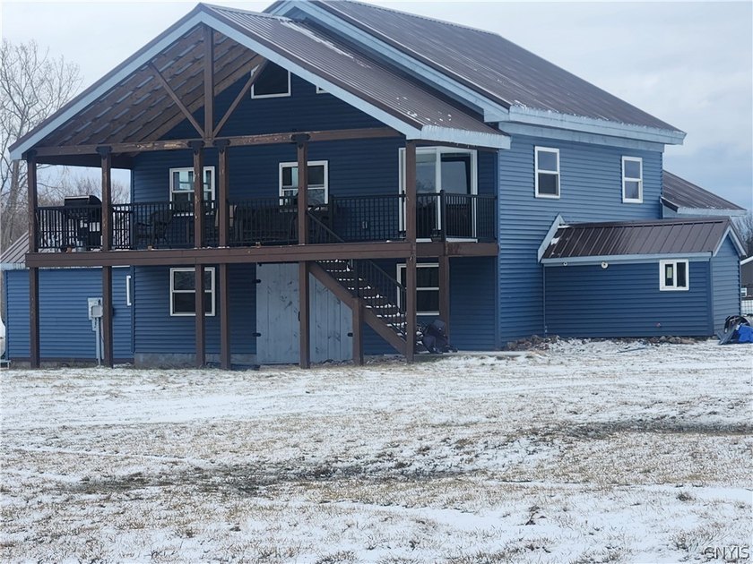 Step into a unique blend of historic charm and modern comfort - Beach Home for sale in Three Mile Bay, New York on Beachhouse.com