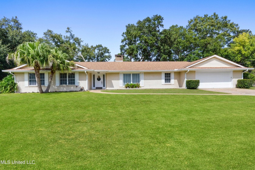 Welcome to 888 Hana Place, a beautifully updated home nestled in - Beach Home for sale in Diamondhead, Mississippi on Beachhouse.com
