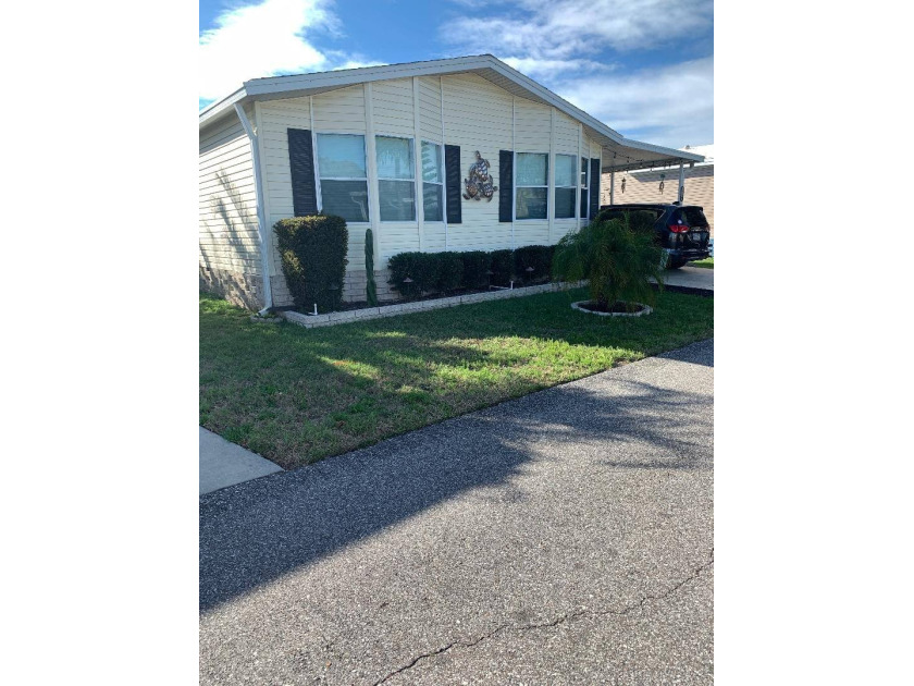 Lovely 3 bedroom / 2 Bath located in Country Place Village (55+ - Beach Home for sale in New Port Richey, Florida on Beachhouse.com
