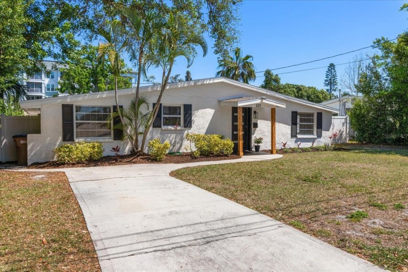 Impressive Mid-Century Modern Belleair home in highly sought - Beach Home for sale in Belleair Beach, Florida on Beachhouse.com