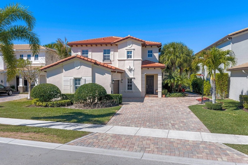 Located on a peaceful lakefront setting, this 4 or 5 bedroom - Beach Home for sale in Jupiter, Florida on Beachhouse.com