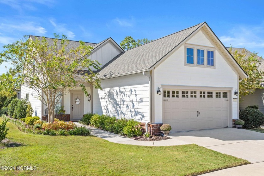 Welcome to this stunning two-story home in a vibrant 55+ - Beach Home for sale in Wilmington, North Carolina on Beachhouse.com