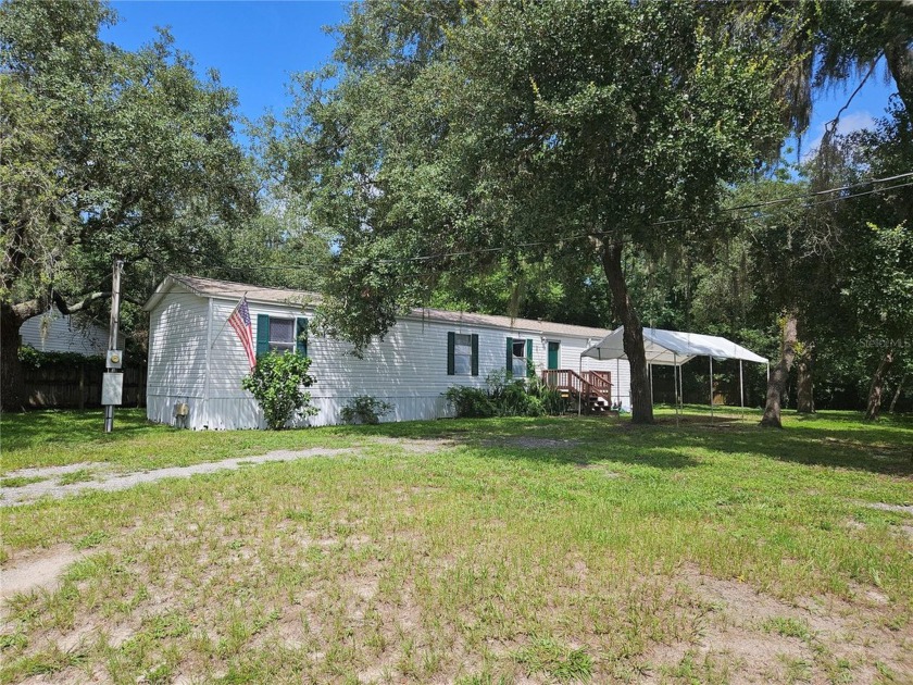 This 3 bedroom, 2 bath home built in 2000 sits on a choice - Beach Home for sale in New Port Richey, Florida on Beachhouse.com