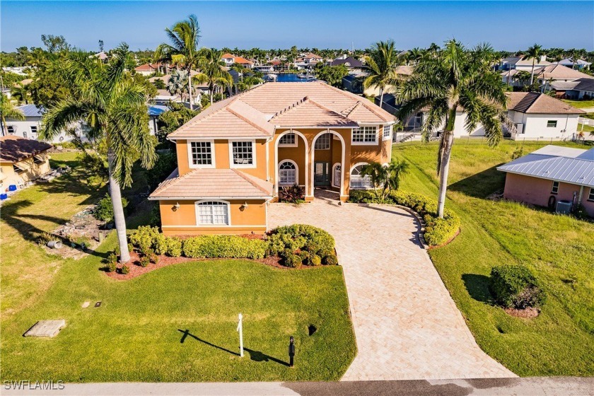 Welcome to paradise in Southwest Cape Coral! This luxurious - Beach Home for sale in Cape Coral, Florida on Beachhouse.com