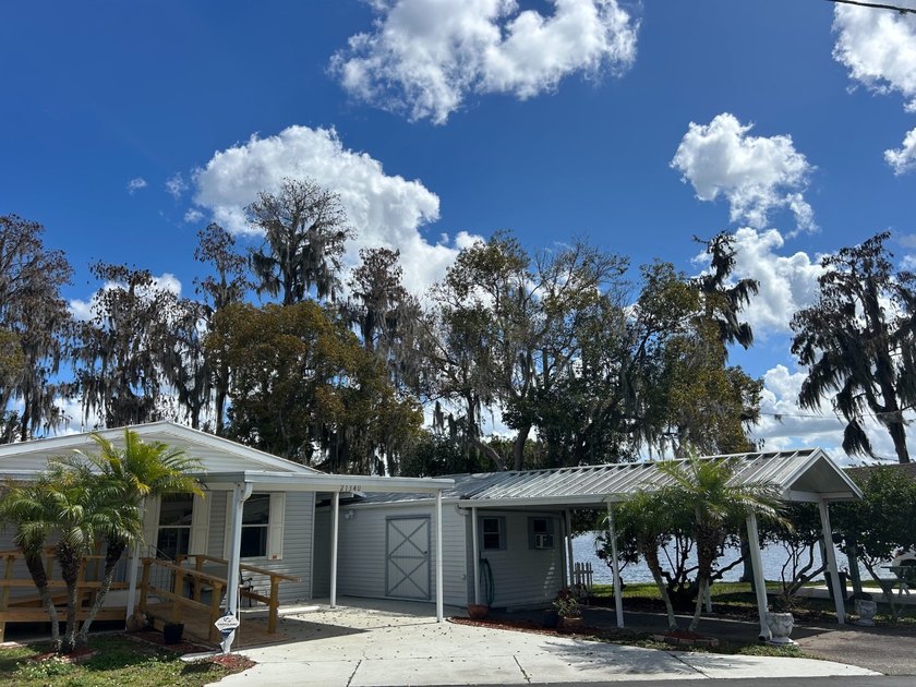 LAKE FRONT LIVING IN LAND O LAKES HAS NEVER BEEN EASIER! THIS - Beach Home for sale in Land O Lakes, Florida on Beachhouse.com