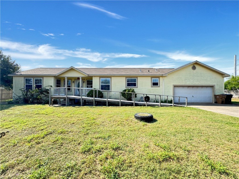 Welcome home to this generously sized house in the popular Flour - Beach Home for sale in Corpus Christi, Texas on Beachhouse.com
