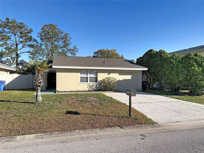 Welcome home! Your 3-bedroom, 2-bath residence with a 1-car - Beach Home for sale in Tampa, Florida on Beachhouse.com