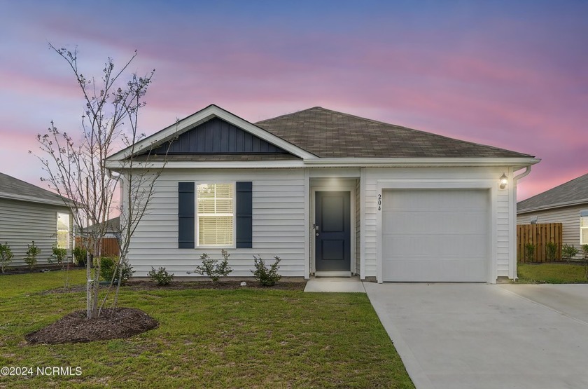 Just 2 miles from the iconic Surf City Pier, this like-new - Beach Home for sale in Surf City, North Carolina on Beachhouse.com