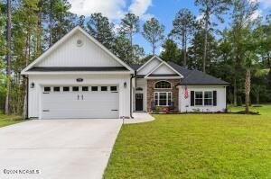 Welcome to 416 Sandlewood Drive, where modern luxury meets - Beach Home for sale in Calabash, North Carolina on Beachhouse.com