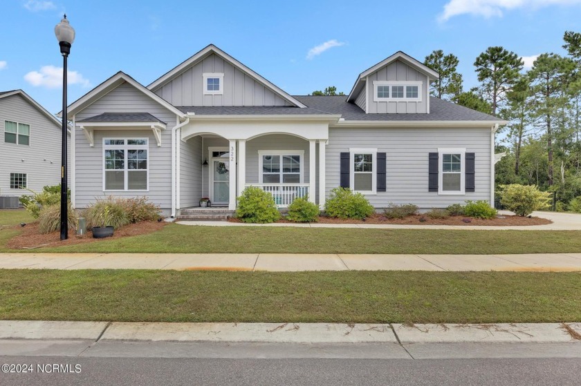 Discover this charming 3-bedroom, 3-bathroom home in the - Beach Home for sale in Hampstead, North Carolina on Beachhouse.com