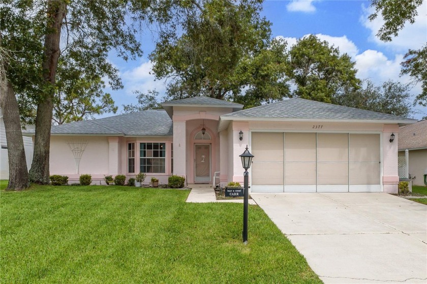 Welcome to your dream home in the vibrant 55+ gated community of - Beach Home for sale in Spring Hill, Florida on Beachhouse.com