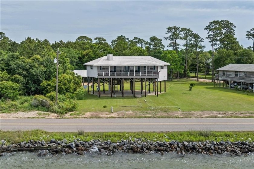 Welcome to your private waterfront escape on Shell Belt Road - Beach Home for sale in Coden, Alabama on Beachhouse.com