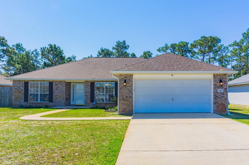 This IMMACULATELY maintained home is waiting for you to Move - Beach Home for sale in Navarre, Florida on Beachhouse.com