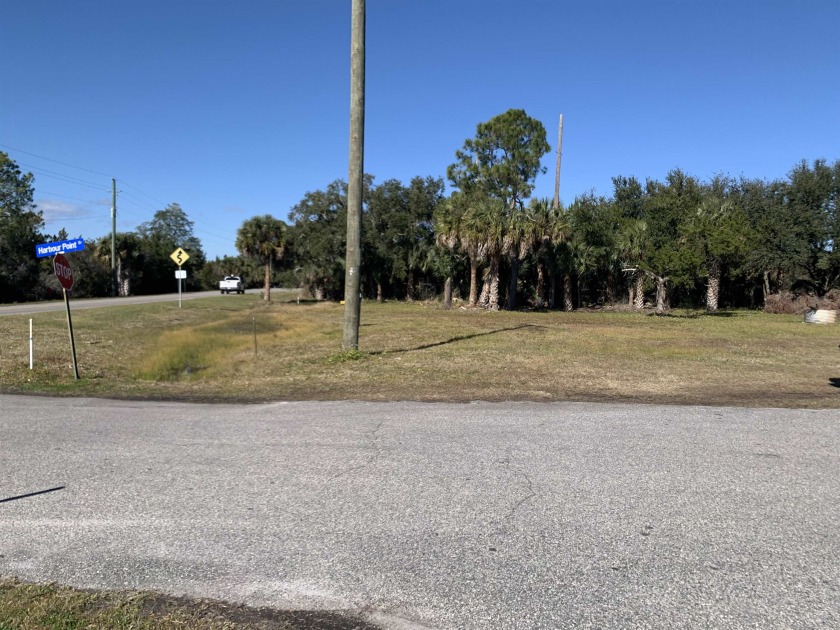 Vacant C-2 lot at the entrance to Shell Point on the corner of - Beach Commercial for sale in Shell Point, Florida on Beachhouse.com