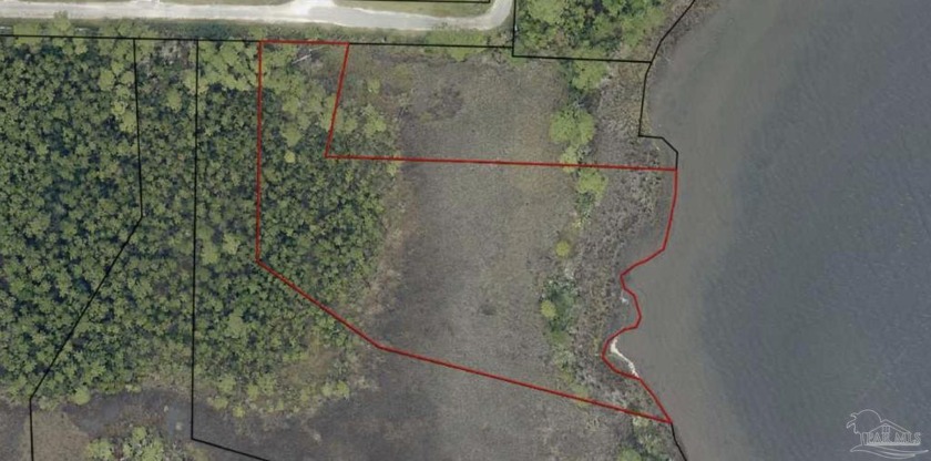 Situated along a quiet road lined with custom homes with a wide - Beach Acreage for sale in Bagdad, Florida on Beachhouse.com
